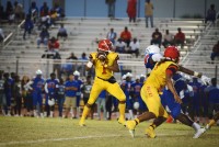 Deerfield Beach Bucks QB Derohn King back for the pass